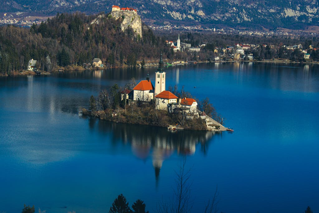 Stunning view of Lake Bled with a church on the island and Bled Castle in Slovenia.
